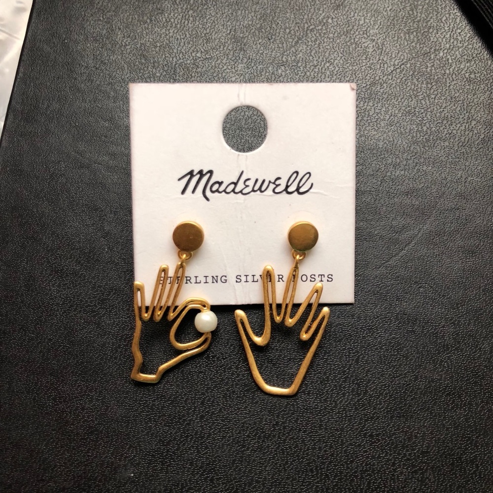 Madewell hand with pearl earrings